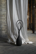 Saturn black vase